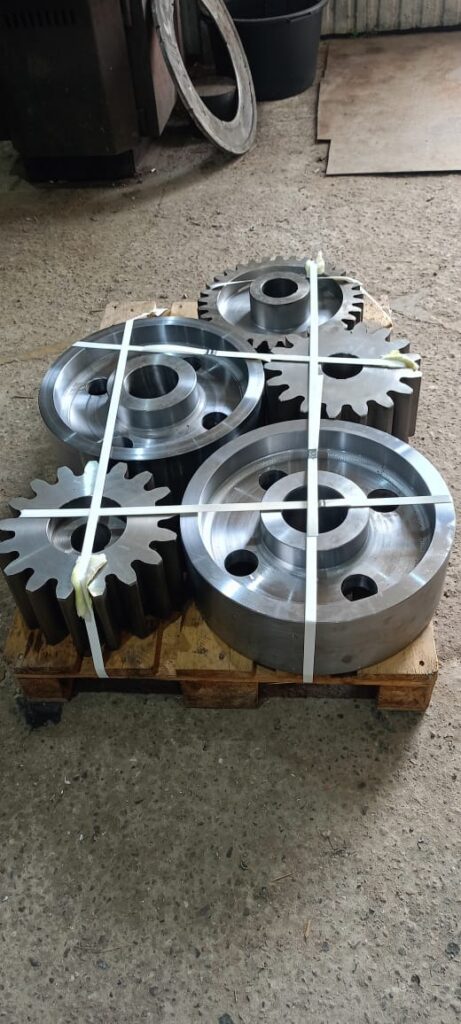 Опорные колеса и приводные шестерни печи